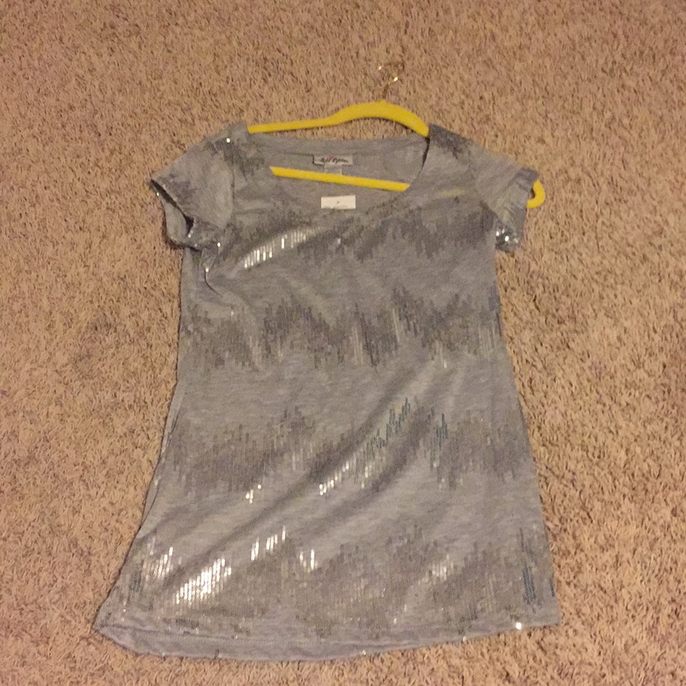 Awesome silver shirt.